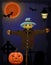 Halloween pumpkin and scarecrow in the night sky