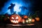 Halloween pumpkin with scarecrows and blue mist