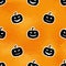 Halloween pumpkin. Seamless pattern. Polygon orange background.