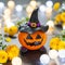Halloween pumpkin tangerine with black witches hat