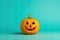 Halloween pumpkin on a turquoise background, 3d render