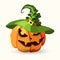 Halloween pumpkin wearing green witch hat