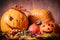 Halloween pumpkins, carved jack-o-lantern in fall leaves