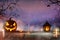 Halloween pumpkins on dark spooky forest.