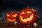 Halloween pumpkins festive background. Moonlight and candlelight. Jack-o-lantern halloween mystic background with mist, spiders,