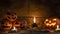 Halloween pumpkins head jack o lantern on wooden table background in a mystic  forest at night.