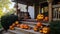 Halloween pumpkins jack o\\\' lanterns on front porch, exterior home decor, seasonal decorations