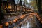 halloween pumpkins on a path lined with houses in the woods