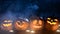 Halloween pumpkins with smoke