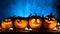 Halloween pumpkins on smoky background