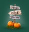 Halloween pumpkins under old wooden pointer. Unusual 3d illustration. Halloween concept