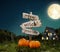 Halloween pumpkins under old wooden pointer. Unusual 3d illustration. Halloween concept