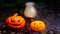 Halloween pumpkins on the wooden table.