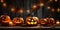 Halloween pumpkins on wooden table in Halloween theme