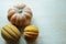 Halloween punpkin and melons background with copy space. Selective focus and bokeh.