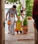 Halloween is always a real treat. Full length shot of a father and his adorable young sons trick or treating together on