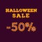Halloween sale minus fifty percents inscription typography made of small candy corns. Holiday trick or treat concept