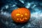 Halloween scary Night Pumpkin on dramatic dark creepy sky background. Halloween horror