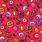 Halloween seamless pattern with cartoon candies in the shape of skulls and eyeballs on red background.