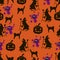 Halloween seamless  pattern for your design  with black silhouette of pumpkins, cats, spiders and witches on a orange