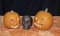 Halloween a Skull and to pipkins on a black Background