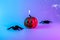 Halloween spider. Scary spooky pumpkin, black night spider on night neon helloween background. Happy Halloween concept