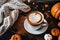 halloween still life with latte, decorations and pumpkins , holiday background