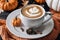 halloween still life with latte, decorations and pumpkins , holiday background