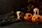 Halloween Stingy Jack pumpkins on rustic background, copy space