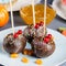 Halloween sweet treats, party food concept. Scary cookies and apples dipped in chocolate