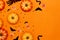 Halloween symbol concept, Scary smiling pumpkins and black bat with spider on orange background