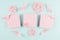 Halloween template for design of cut paper - trendy pink blank labels with flock bats fly and funny emoji faces on pastel blue.