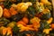 Halloween, Thanksgiving seasonal fall autumn holiday celebration background, a close up of a variety of unique unusual squash gour