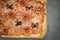 Halloween-Themed Pizza with Spider-Shaped Pepperoni and Olives C