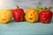 Halloween themeScary Halloween Colorful Halloween food background with colorful healthy stuffed red and yellow sweet bell peppers