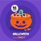 Halloween trick or treat orange candy bowl on the purple layer.