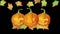 Halloween Twinkling Tealight Candle Lit Carved Pumpkins with Falling Autumn Leaves
