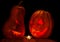 Halloween two pumpkin Jack lamp look at each other with a candle