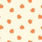 Halloween vector toss pattern with orange pumpkins on cream