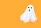 Halloween white spooky ghost spirit on orange backgrounds. Minimal concept scary autumn