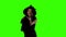 Halloween witch with black fan on green screen