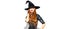 Halloween. witch with bright holiday makeup. Beautiful young woman posing in witches costume over white