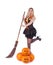 Halloween witch in dress with pumpkin, broom