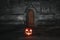 Hallowen pumpkin in front doors in church , United Kingdom 2021