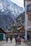 Hallstatt/Austria- December 26, 2019: Colorful little houses on the hill in Hallstatt, a charming traditional village and a famous