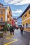 Hallstatt/Austria- December 26, 2019: Tourists on the streets of Hallstatt, a charming traditional village and a famous tourist