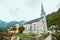 Hallstatt, Austria - June 15, 2019: Evangelische Pfarrkirche church with bell tower