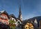 Hallstatt colorful buildings and Evangelical Church tower - Hallstatt, Austria