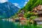 Hallstatt old town houses on green hill in Austria