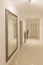 Hallway with large wall mirror